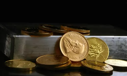 Lingot en argent et pièces en or
